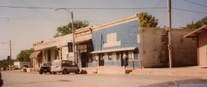 East side of Main Street in Schell City. Blue and white building was Dickbreder's grocery store and cafe.